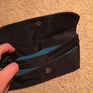 Black clutch with iPhone pocket